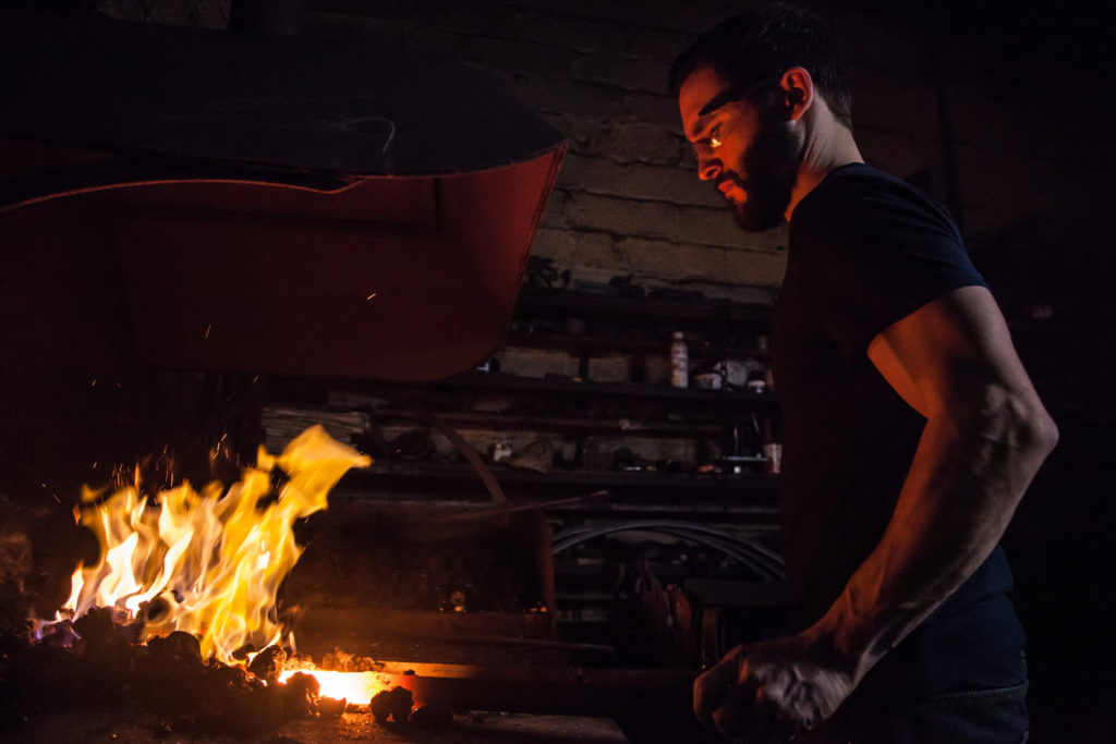 black smith working with tools